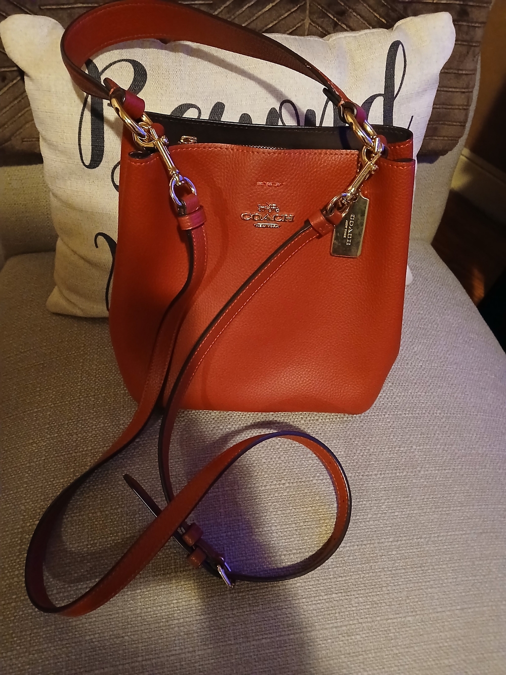 Coach Pebbled Leather Crossbody Bucket Bag in Orange